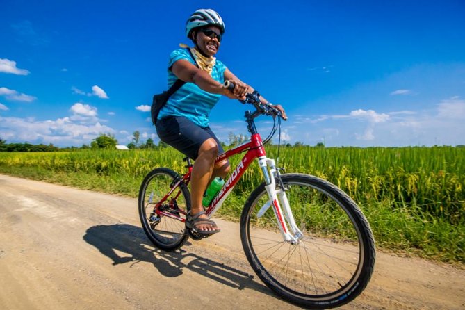Chiang Mai Active E-bike Countryside Ride - Ban Tawai: walking through wood carving craft