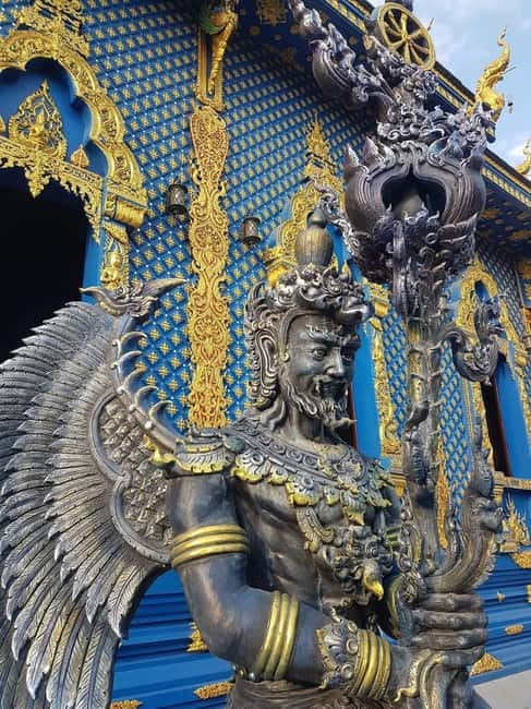Chiang Mai: Chiang Rai Temples and Long-Neck Karen Village - Wat Rong Suea Ten: deep blue tones with golden accents