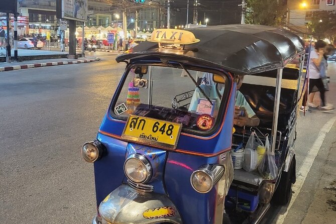 Chiang Mai Temples and Market Tuk-Tuk Evening Night Tour - Tuk-tuk rides: fast city sighting with a real-world caution
