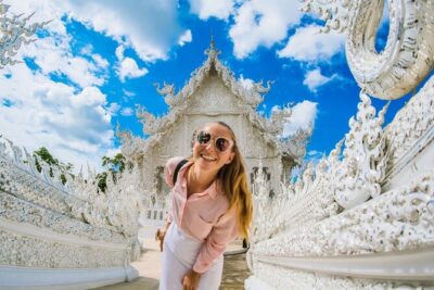 Chiang Rai White Temple Blue Temple and Hill Tribe Village Tour - Wat Rong Khun (White Temple): glasswork, bright angles, and crowds