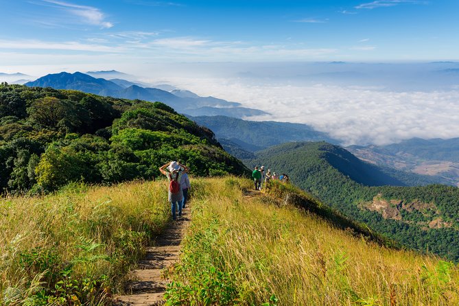 Doi Inthanon National Park - Thailand's Highest Peak - Wachirathan Falls: misty power breaks up the day