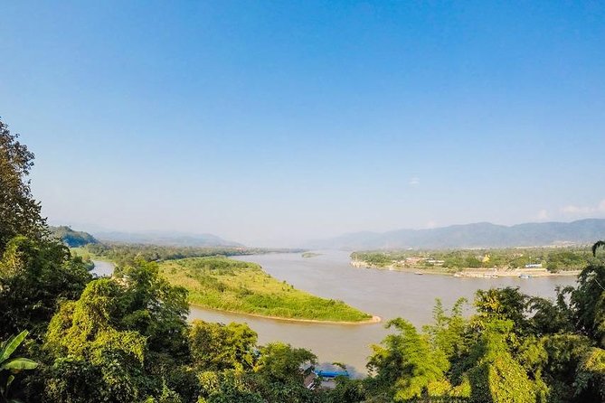 From Chiang Mai: White and Blue Temple & Golden Triangle Day Trip - Mekong River boat trip in Chiang Rai Province: scenery time breaks the driving