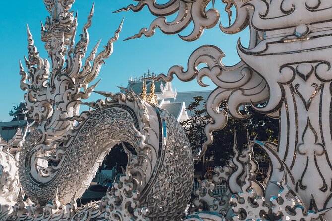Full-Day Chiang Rai Temples Tour from Chiang Mai with Hot Spring - Wat Rong Khun White Temple: why the mirrors feel almost unreal
