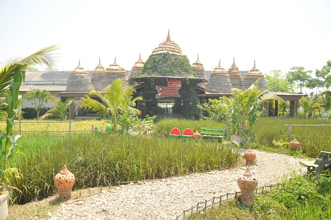 Morning Cooking Class in Organic Farm with Local Market Tour - Somphet Market: how to shop for Thai flavor (not just snacks)
