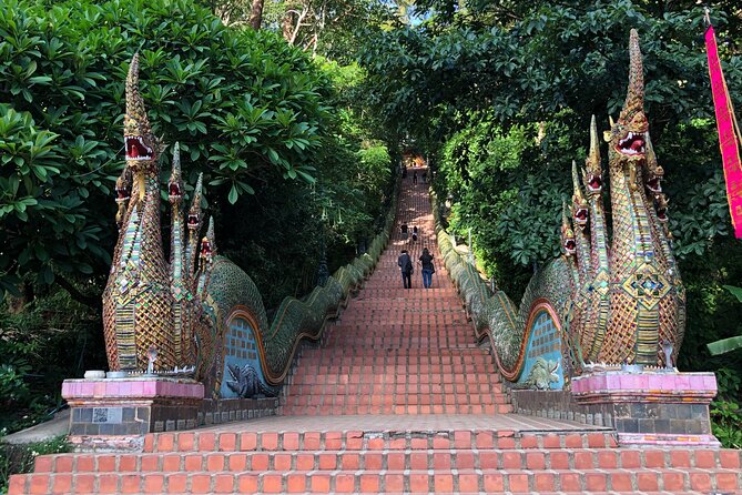 One Day Tour Doi Suthep Temple, Palad Temple, Orchid Farm, Longneck hill tribe village (Private tour) - Khao Soi lunch: included, and it anchors the whole day
