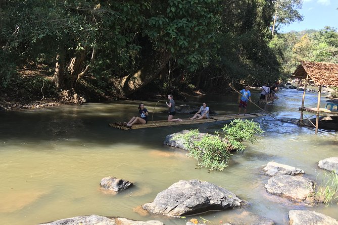 Private: 3 days 2 night trip: ChaingMai-Chaingrai- The Golden Triangle trip - Day 3: Mae Sai markets, Golden Triangle history, Mekong boat, Laos island, and Wat Rong Khun