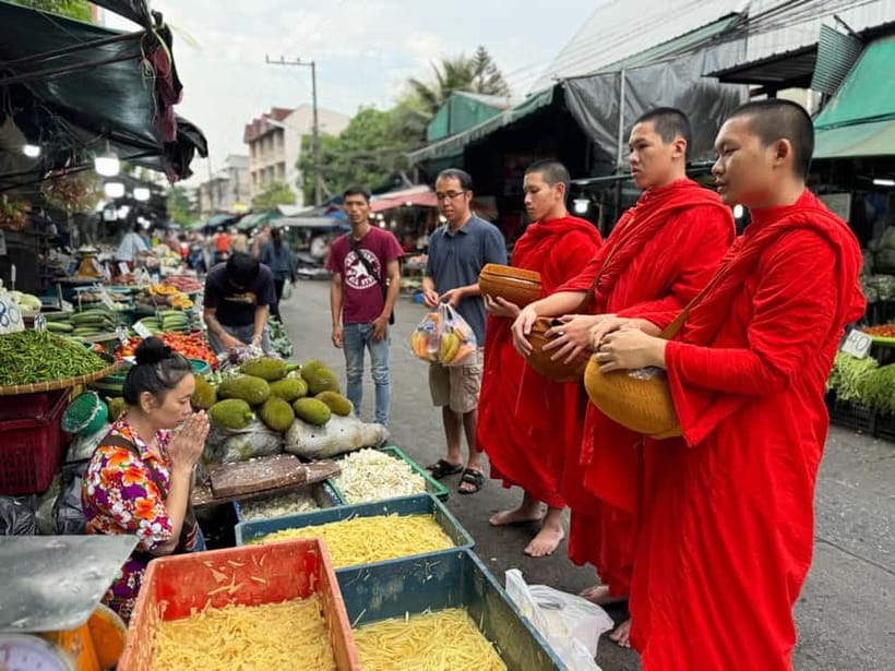 Walk With Monks Collecting Alms(meeting point maybe change) - Walking with monks through the Mueang Mai Market area