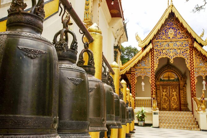 Wat Phra That Doi Suthep & Hmong Village Half Day Tour From Chiang Mai - Optional stops and extra fees: watch for garden and waterfall adds